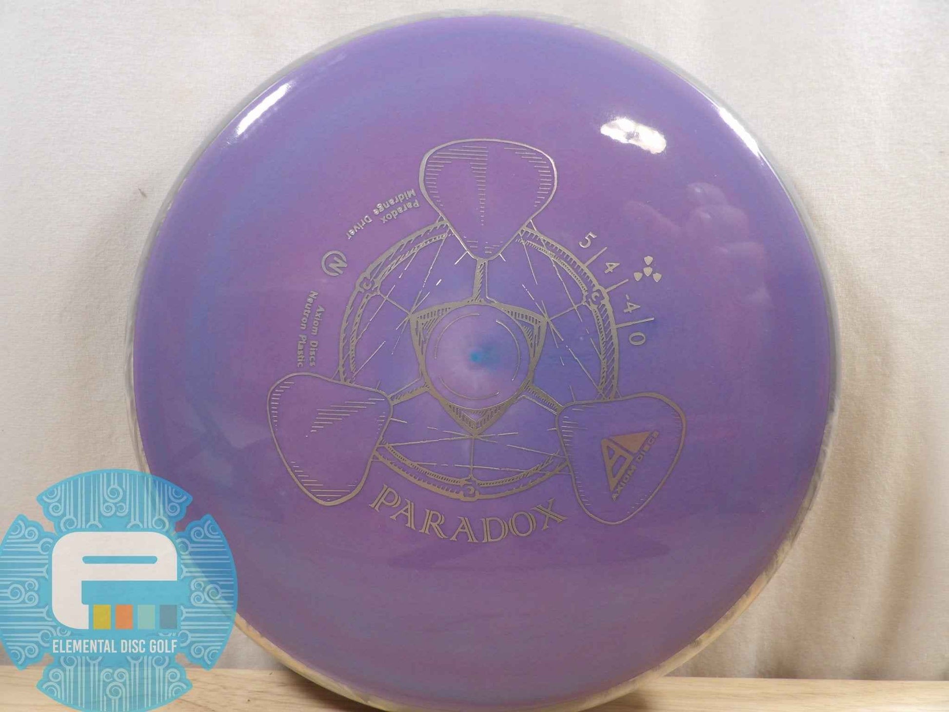 Axiom Neutron Paradox (5/4/-4/0) - Elemental Disc Golf