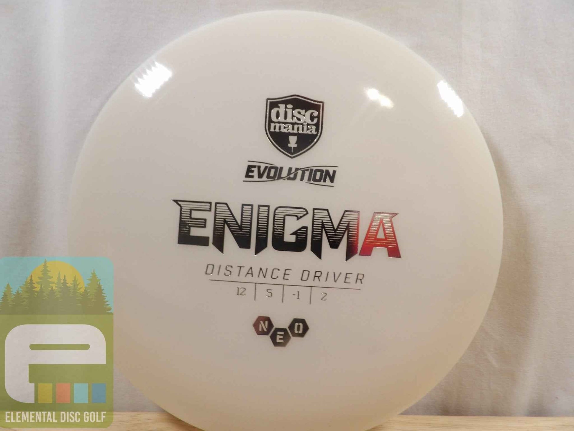 Discmania Neo Enigma (12/5/-1/2) - Elemental Disc Golf