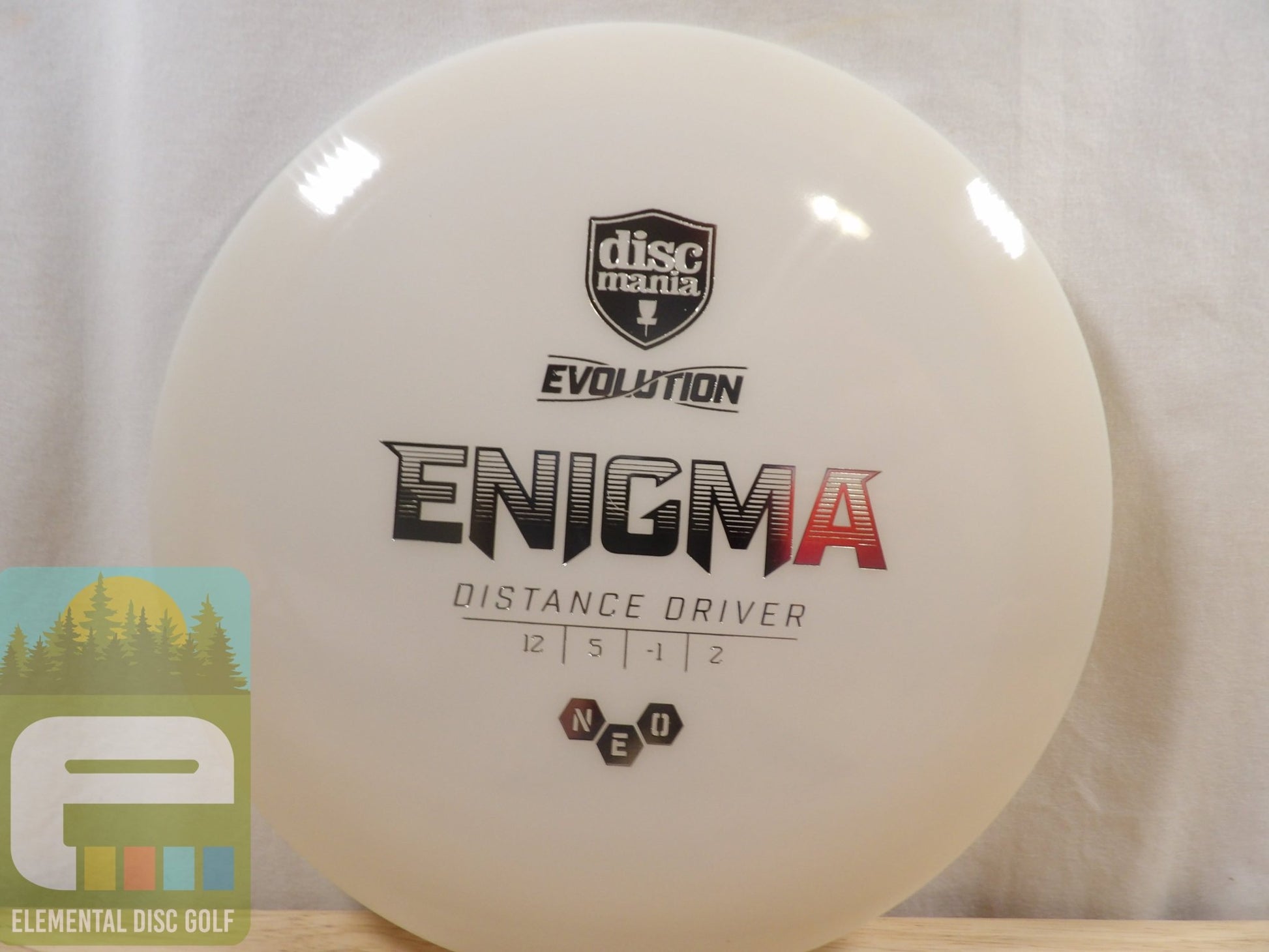 Discmania Neo Enigma (12/5/ - 1/2) - Elemental Disc Golf
