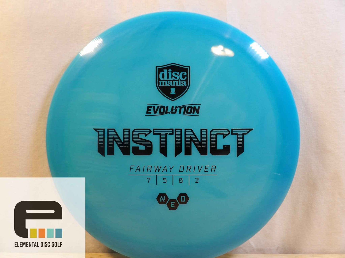Discmania Neo Instinct (7/5/0/2) - Elemental Disc Golf
